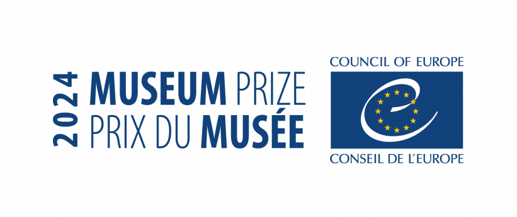 Grafika z napisem "Museum Prize/ Prix du Musee" z logotypem Komisji Europejskiej